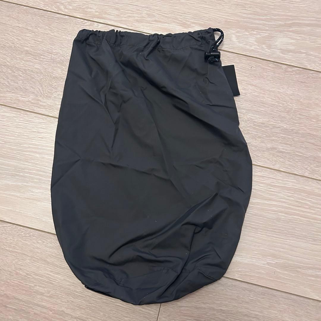 mont-bell トラベルダウンコート/ダウンジャケット/L/BLK収納袋付き