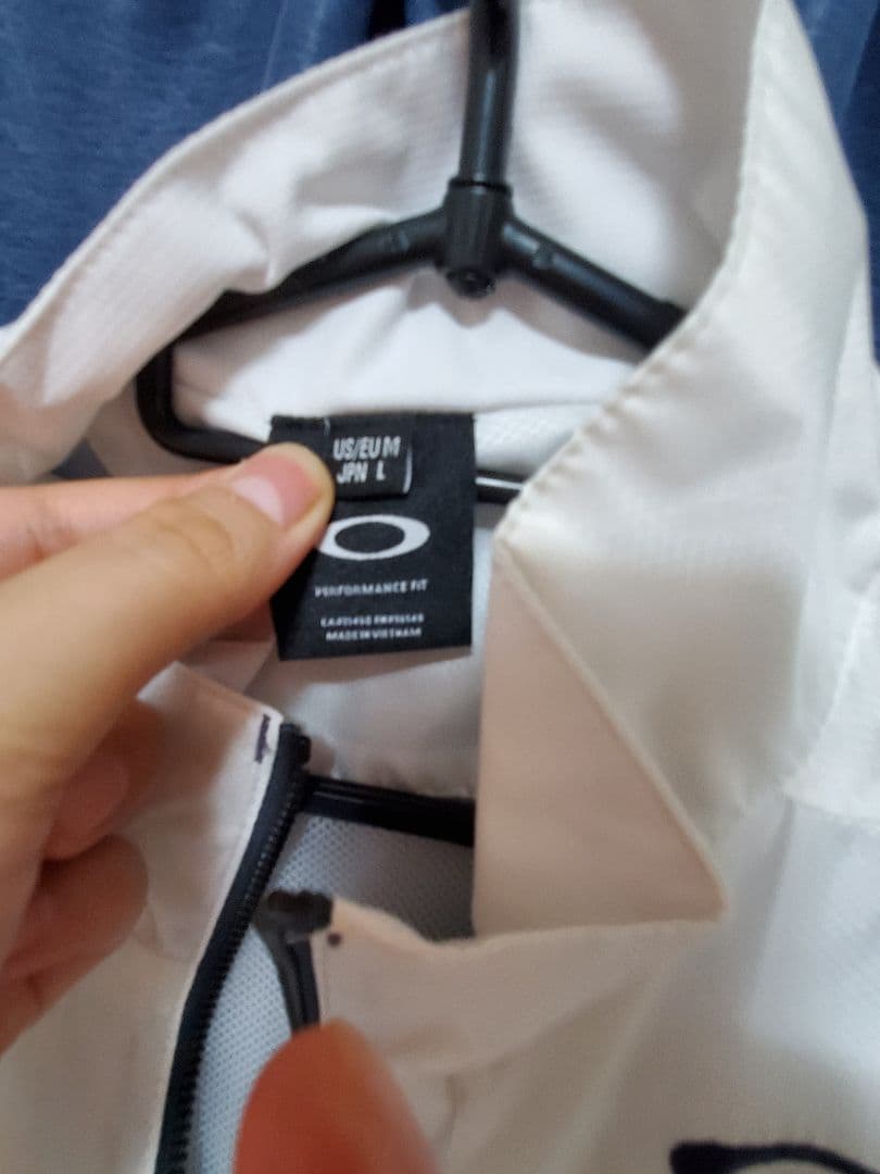 Oakley ホワイトゴルフジャケット メンズウェア