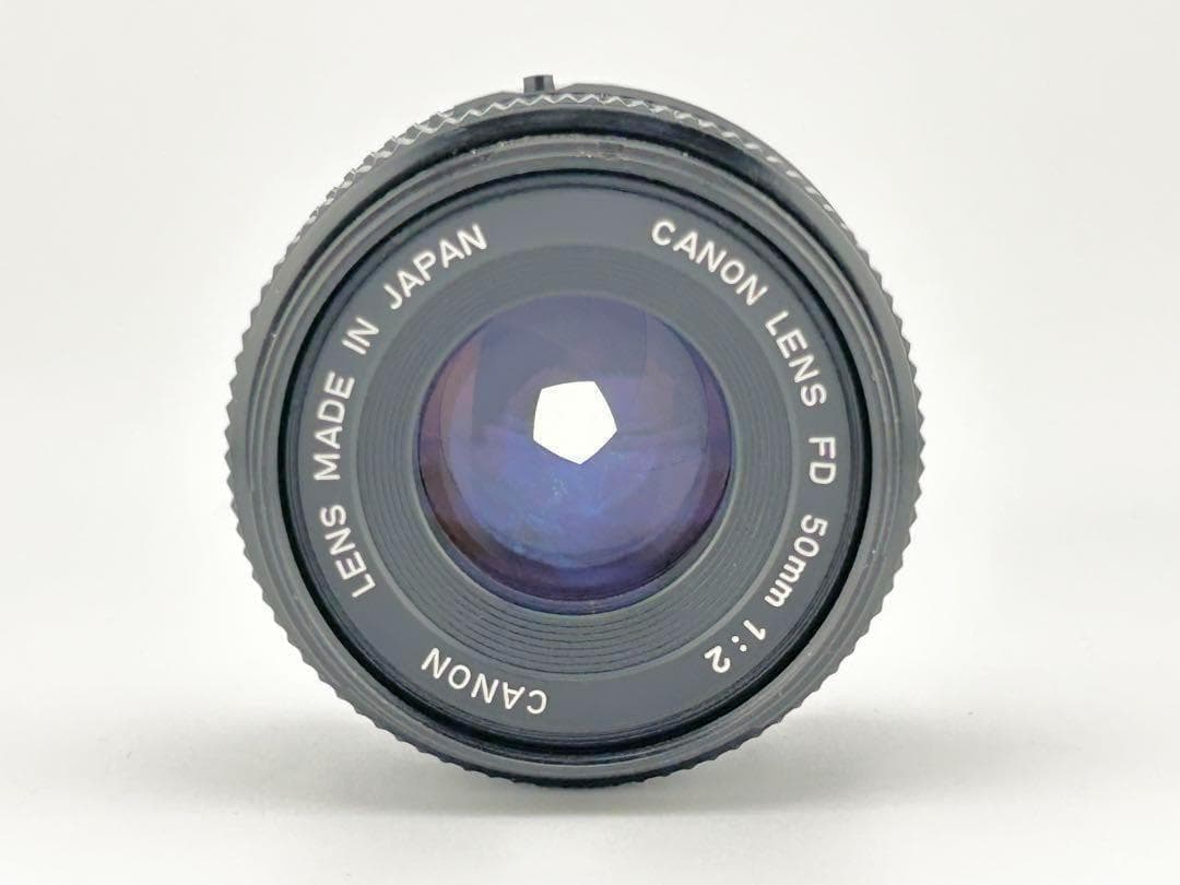 【完動品】　Canon A-1　FD 50mm 1:2 モルト貼替・動作確認済