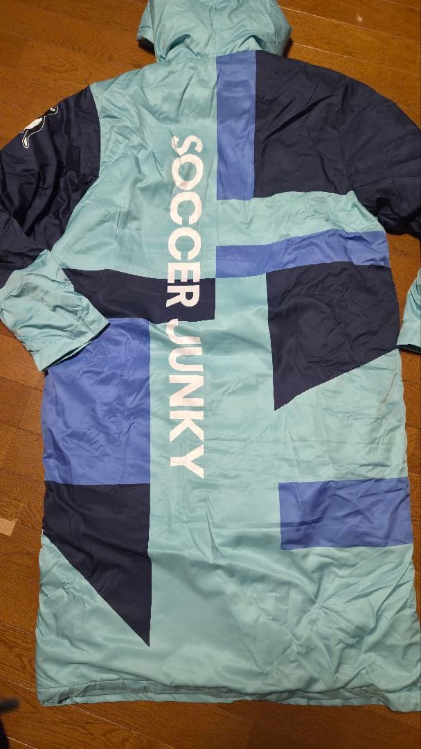 新品/未使用【サッカージャンキー　ベンチコート ブルー】中綿ロングコートL