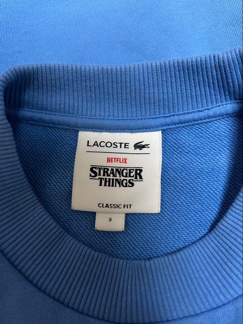 LACOSTE × NETFLIX ワニロゴクルーネックスウェット　トレーナー