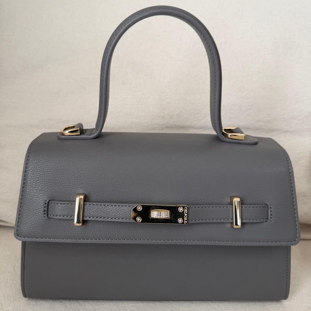 セルフォード　ビジューツイストバックルハンドバッグ　グレー