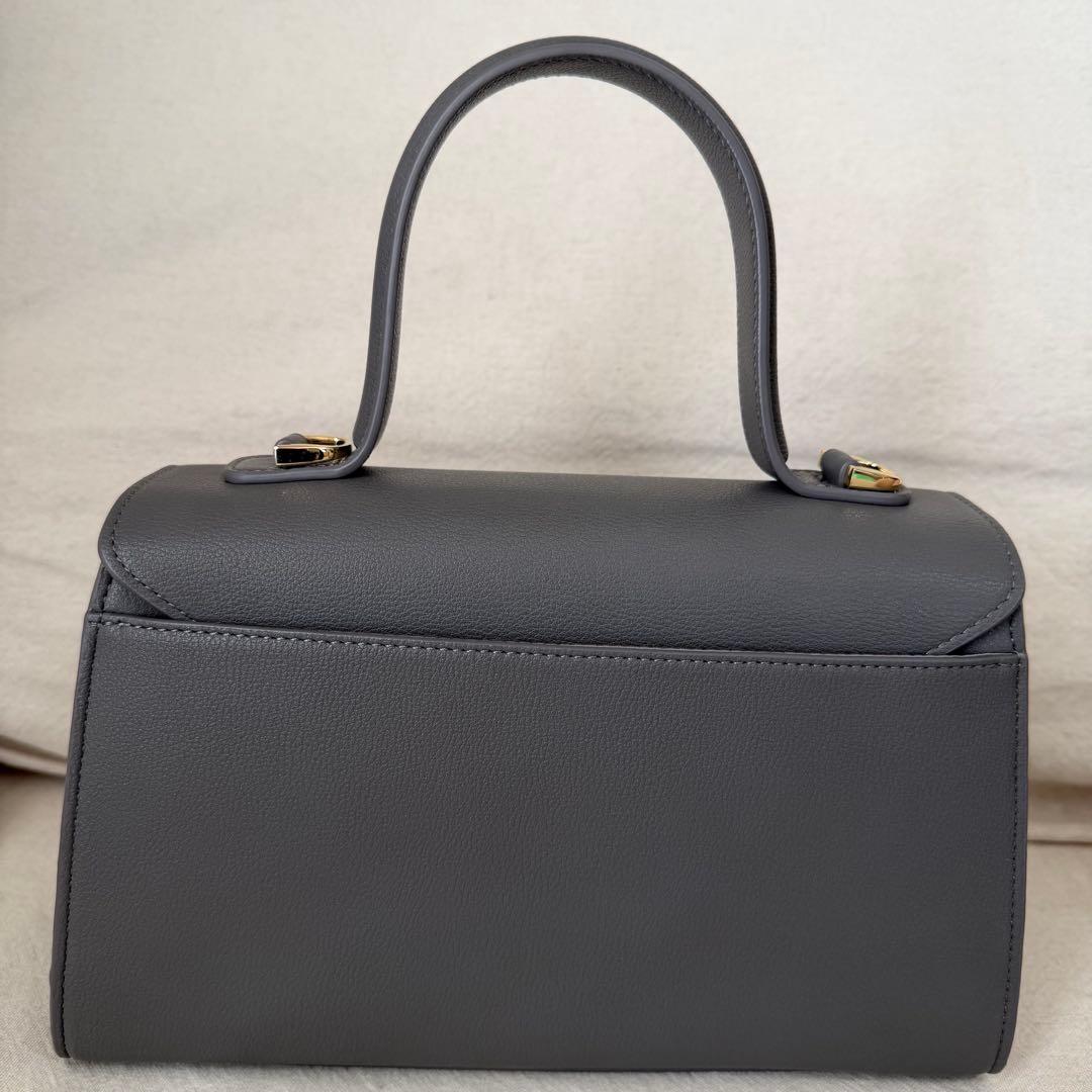 セルフォード　ビジューツイストバックルハンドバッグ　グレー