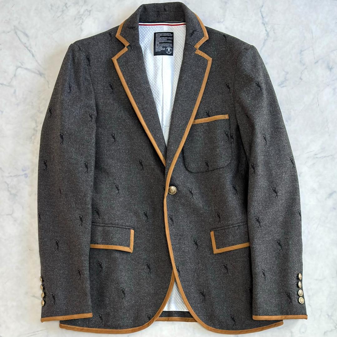 マークアンドロナ ジャケット 刺繡ロゴ パイピング 金ボタン グレー tw5