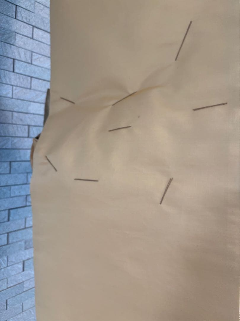 帯をリメイクした飾り結びのあるタペストリー