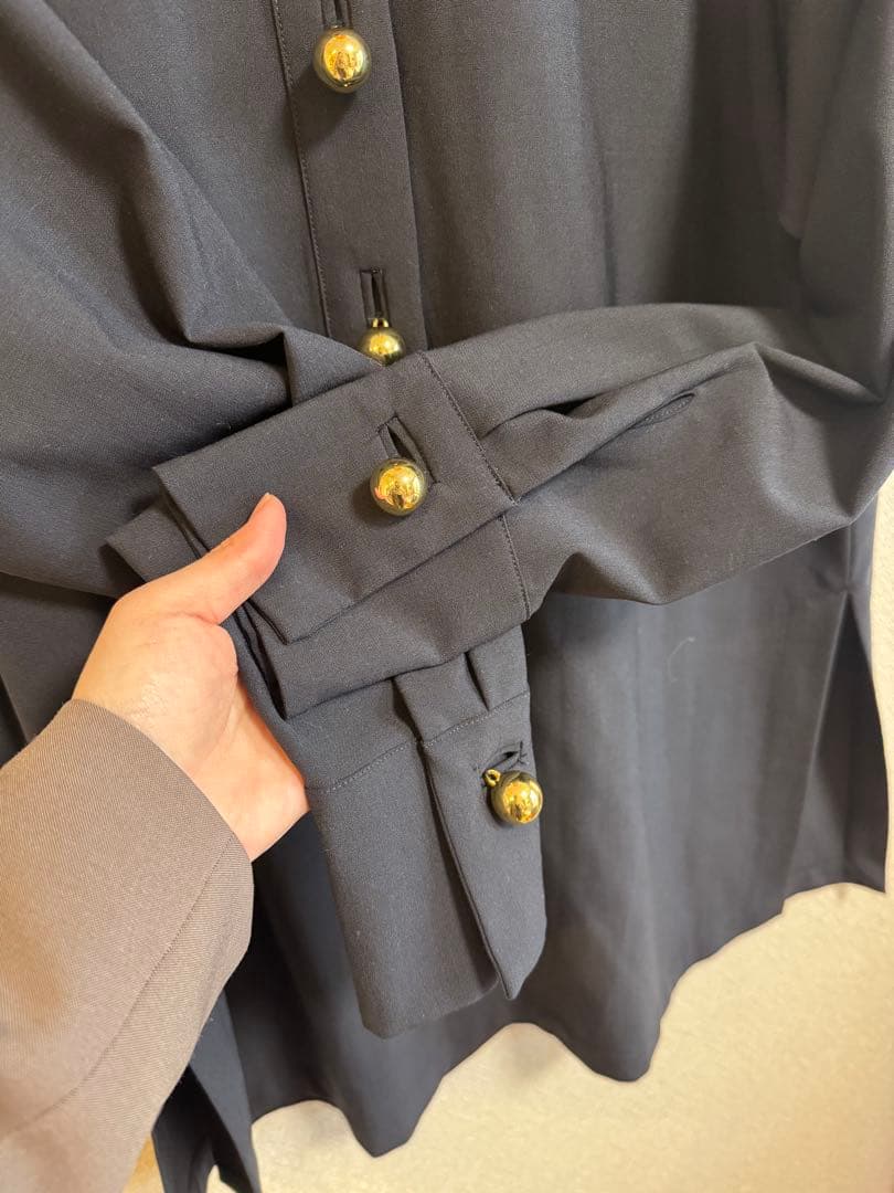 Curensology スフィアボタンブラウス