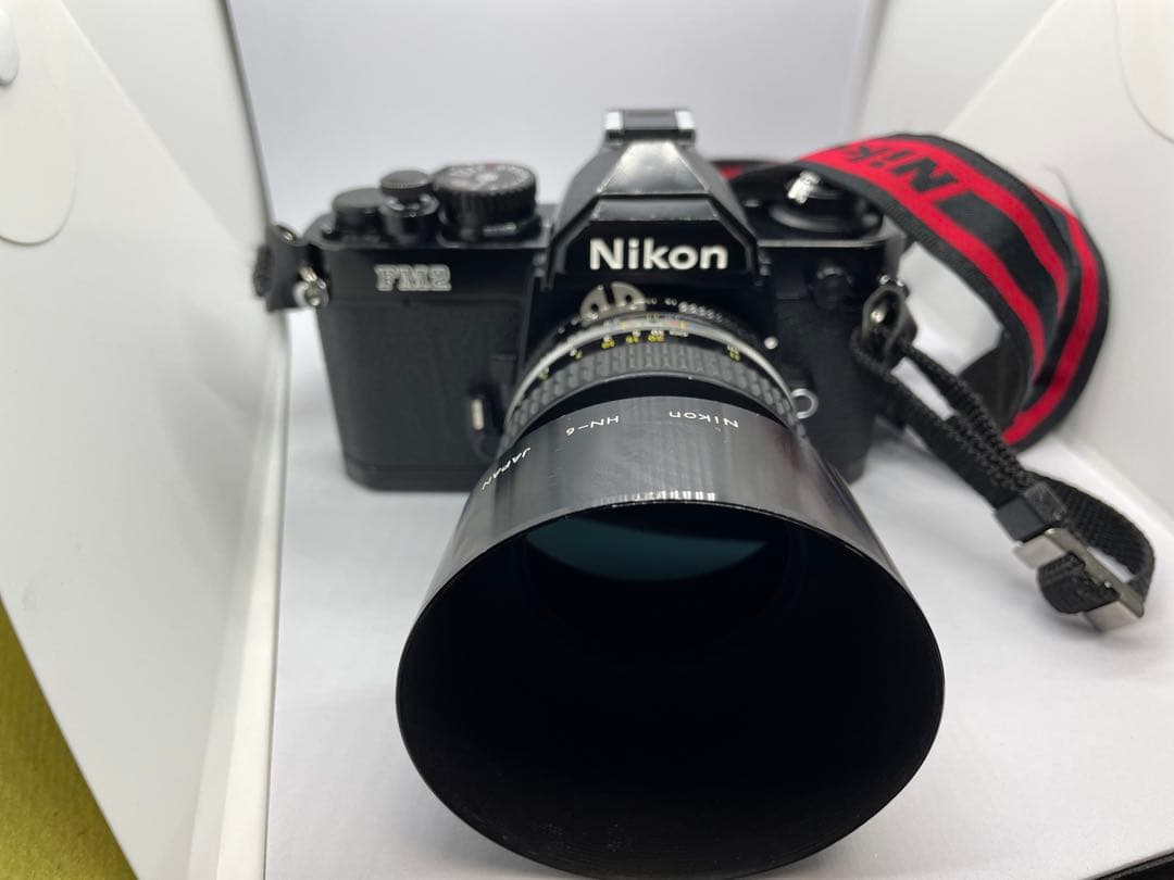 最終価格Nikon New FM2 50mm単焦点、36〜72ズーム、ストロボ付
