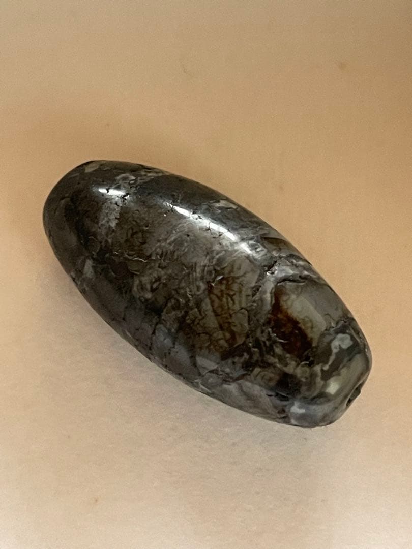 出土　双亀甲天珠