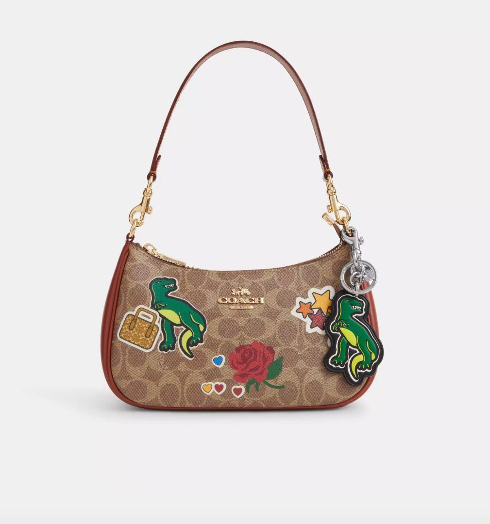 新品coach ダイナソー ステッカー バッグ チャーム