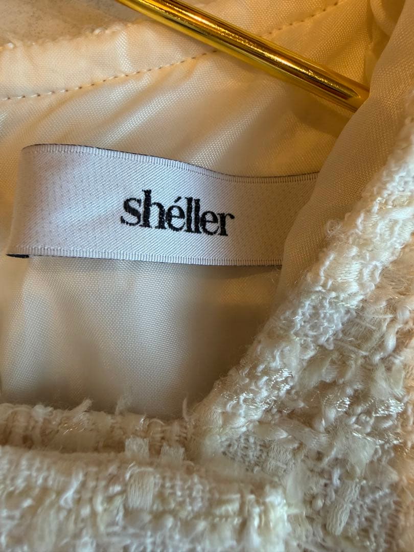 シェリエ shellerアイボリー ツイード ボタン付きミニワンピース