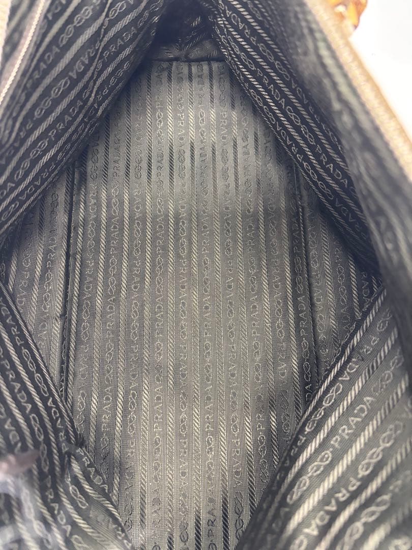 【ショッパー付】プラダ ハンドバッグ レザー 南京錠 ラウンドファスナー