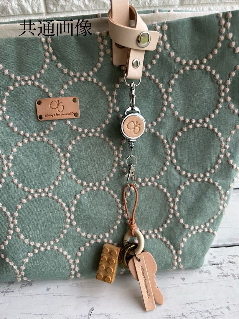 【754】ミナペルホネン　タンバリン　A4縦型トートバッグ　持ち手ヌメ革製