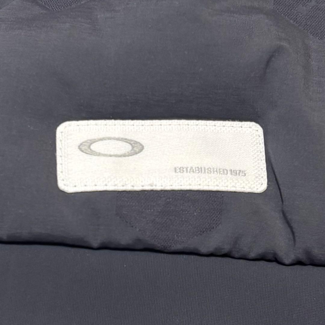 未使用品 オークリー ゴルフ 軽量 ストレッチ ダウンジャケット L