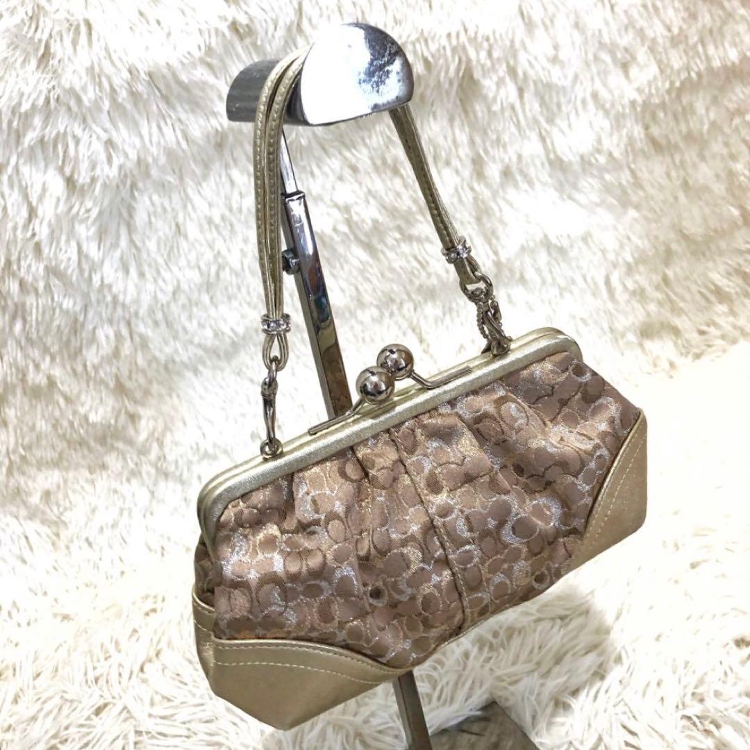 コーチ レザー ミニ ハンドバッグ シグネチャー キャンバス ガマ口