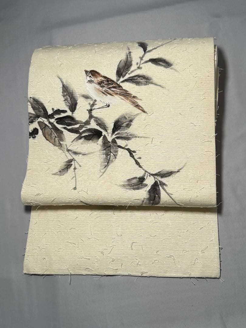 [美品] 髭紬　名古屋帯　正絹　お太鼓柄　雀　白練色　洒落帯　小紋　紬　無地