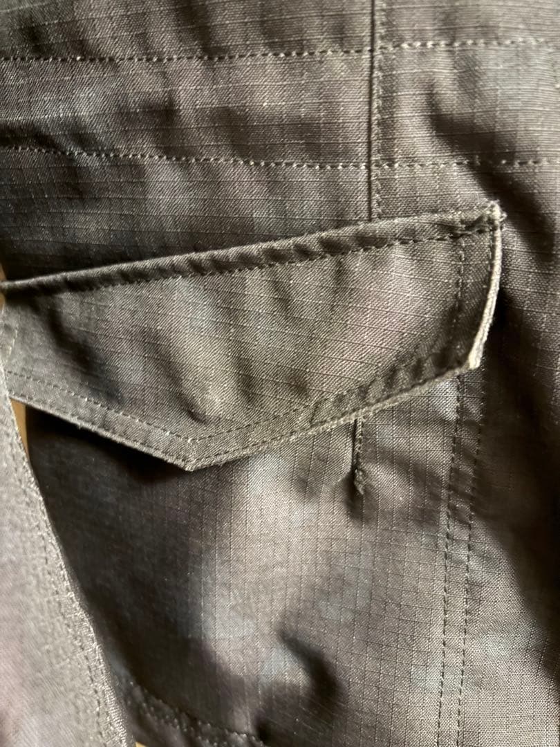 クシタニ フィンジャケット ブラックカモフラ/L