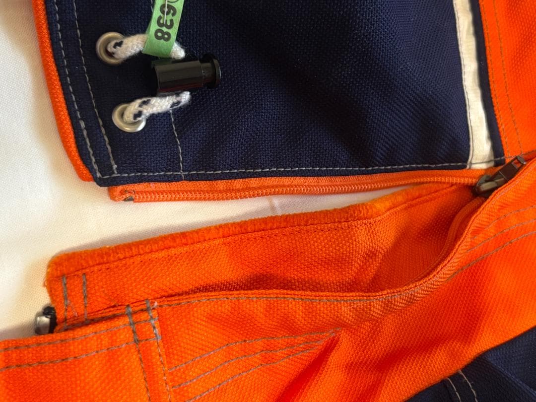 DESCENTEデサント スキースノーボードウェア オレンジ/ネイビー サイズO